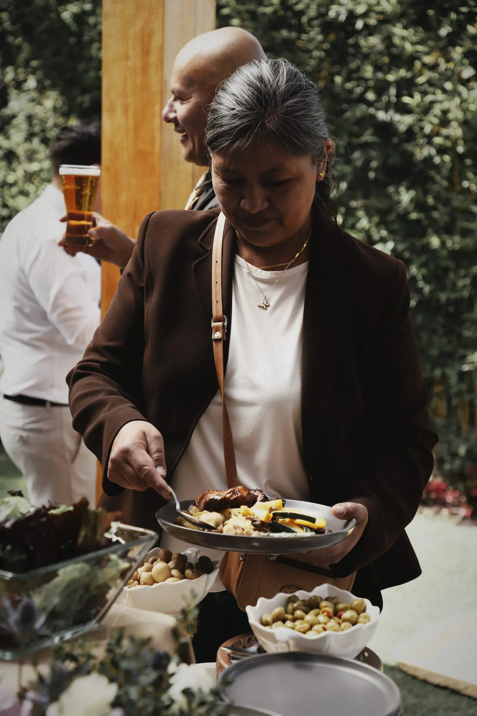 A guest serving herself from the buffet.